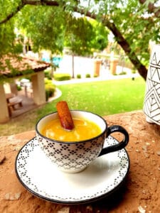 Immunity Tea in a cup with cinnamon stick.