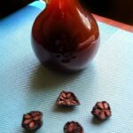 A bottle of kokum sherbet to be mixed with water.