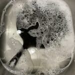 Cast iron pan soaked in soap water.