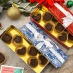 Homemade chocolate in gift boxes in fancy shapes.