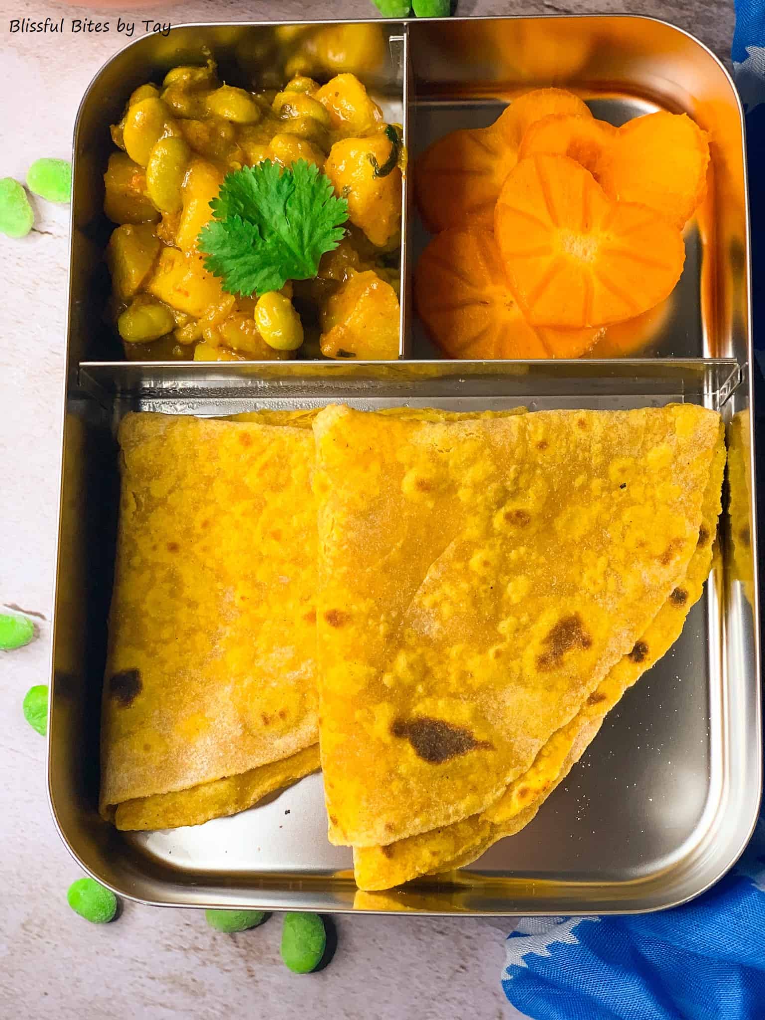 Lunchbox Idea: Carrot Chapati, Potato Edamame Curry and Persimmon Hearts
