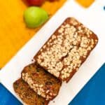 Fruit and nut loaf cake with oats on top.