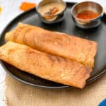Two quinoa dosa with peanut chutney and ginger chutney.