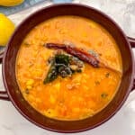 Yellow Squash dal with tempering of curry leaves, dried red chilies and onion.