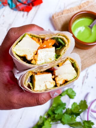 Tofu Tikka Wrap cut into half.