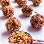 Date, nut and seed energy balls in rows.