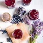 Blueberry chia jam in Mason jars.